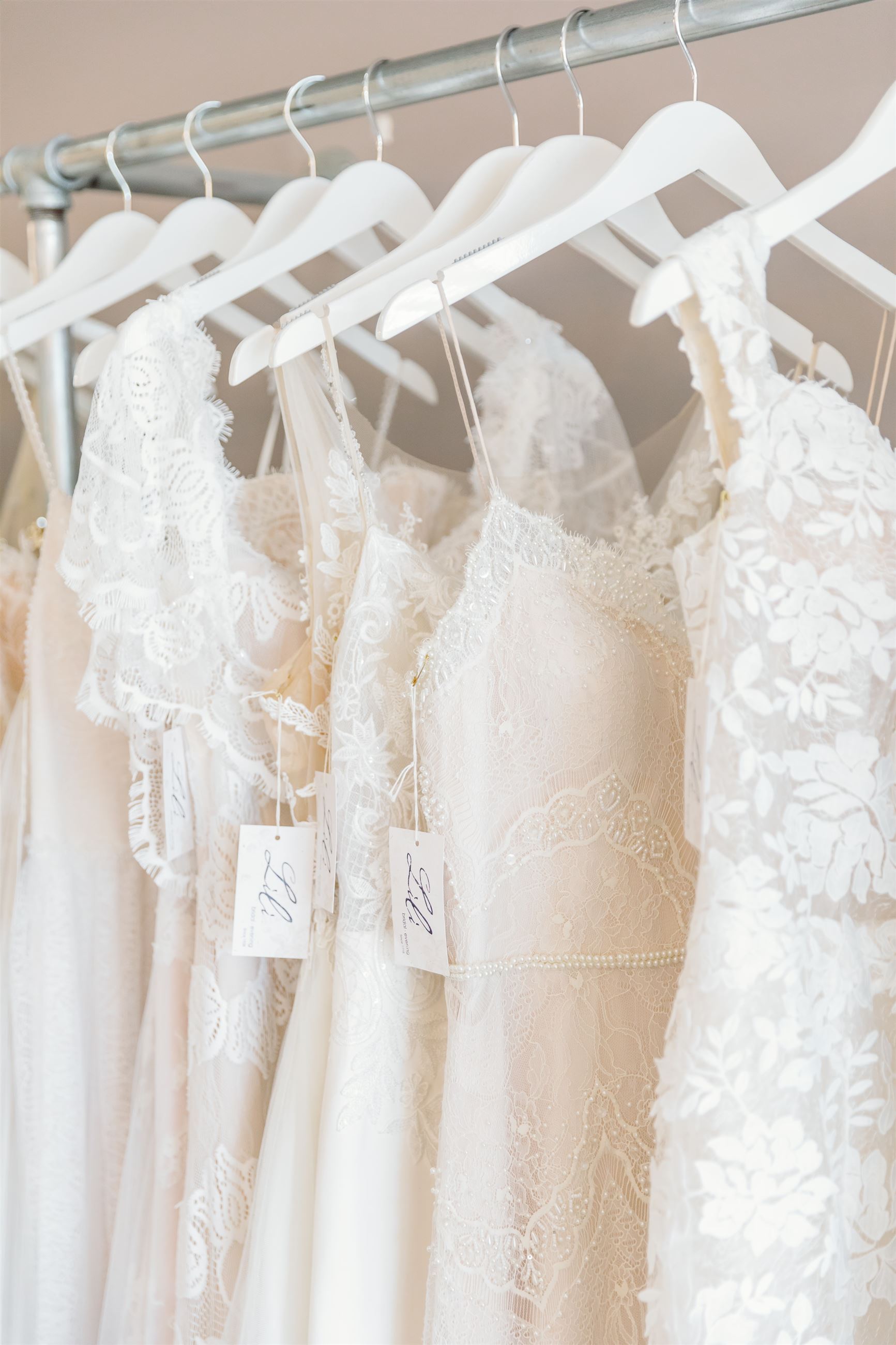 Rack of wedding dresses at Lili Bridal's.