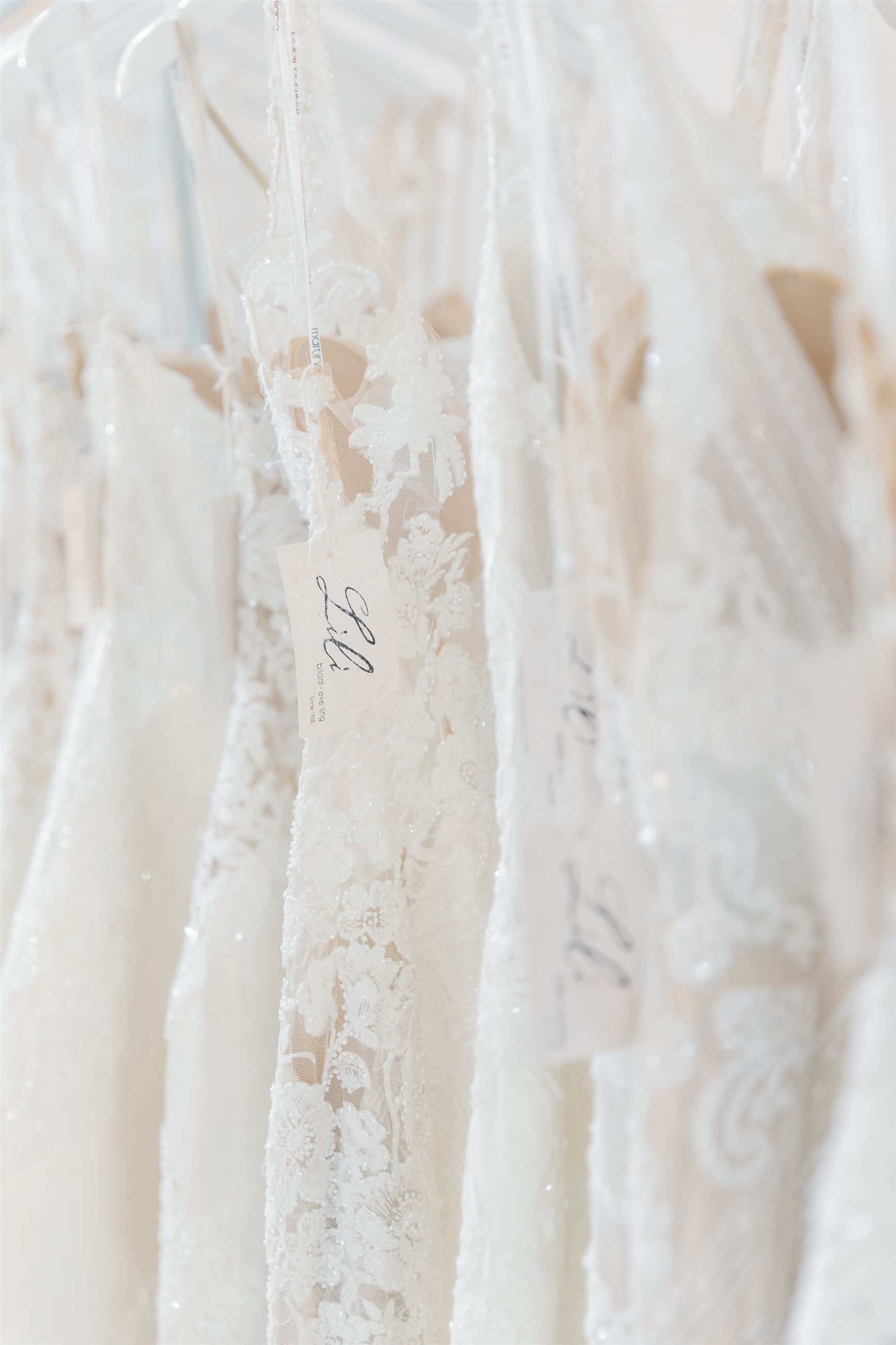 Rack of wedding dresses at Lili Bridal's.