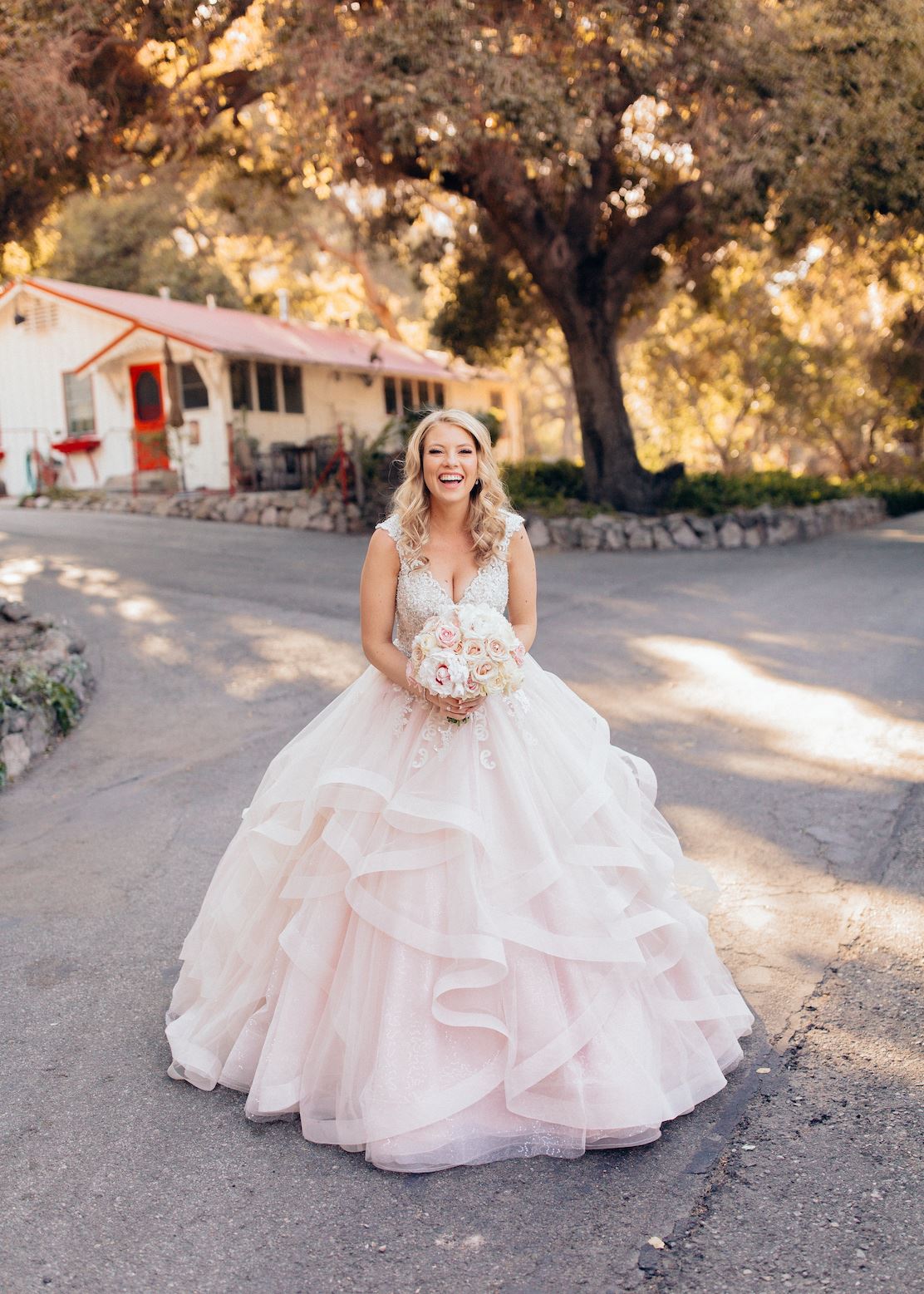 Bride Wearing A Ballgown Wedding Dress Walking Down Street