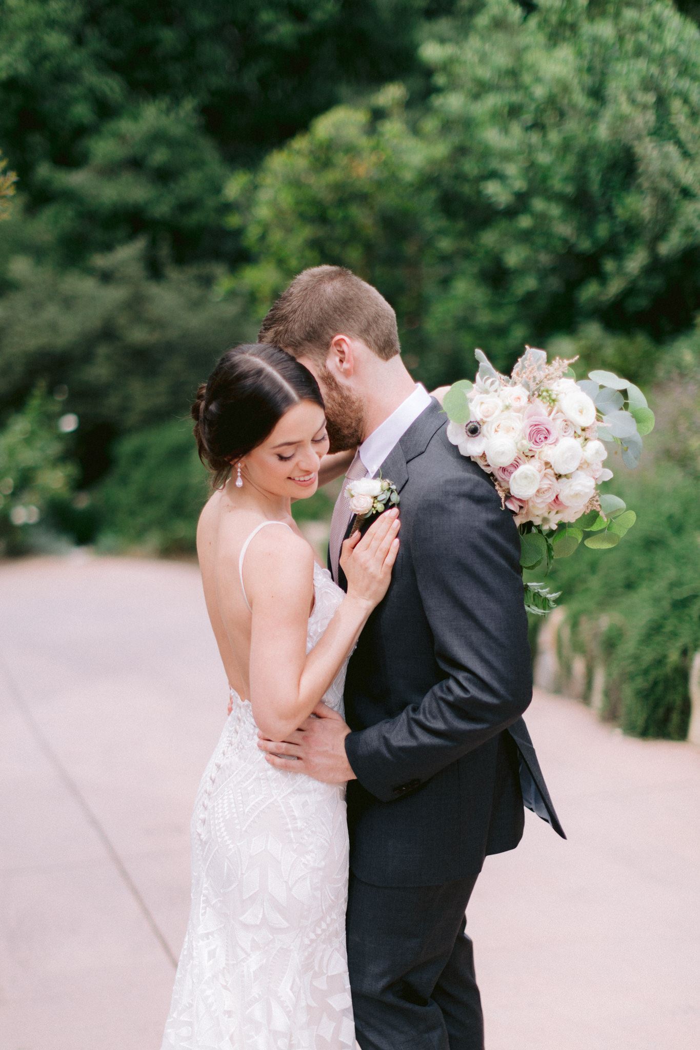 Bride And Groom Hugging Each Other.
