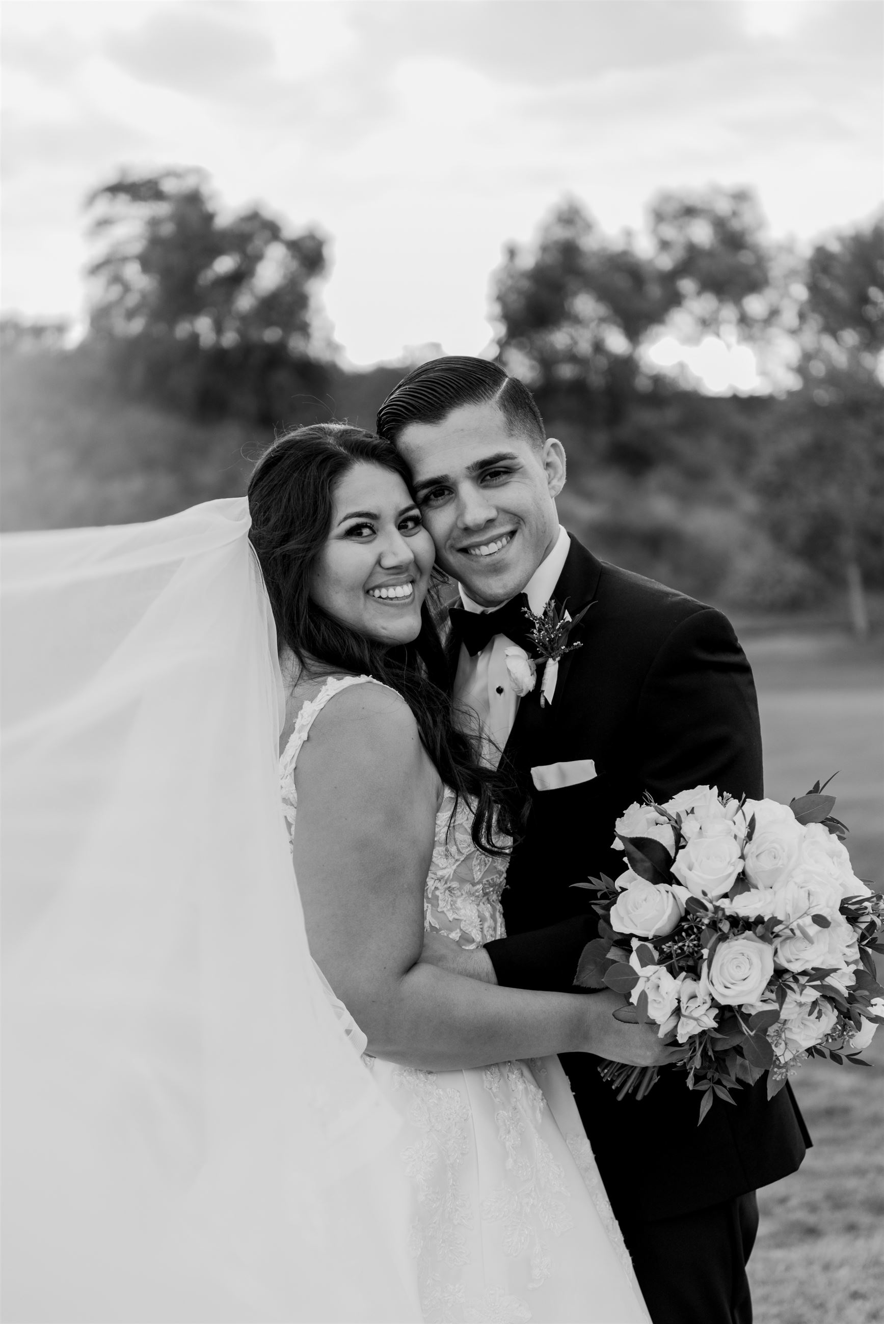 Bride And Groom Hugging.